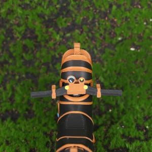 Side profile shot of the Master Cycle Zero motorcycle from Breath of the Wild, recreated as a 3D printed collectible. This image emphasizes the sleek lines, balanced proportions, and functional details like the wheels and suspension system. It’s a top-tier gift idea for Nintendo gamers, Zelda collectors, or fans looking to enhance their game-themed decor with unique, handmade items that bring the world of Hyrule into real life.