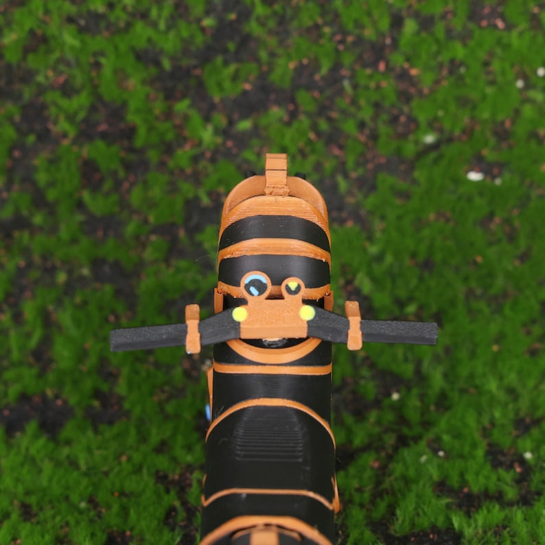 Side profile shot of the Master Cycle Zero motorcycle from Breath of the Wild, recreated as a 3D printed collectible. This image emphasizes the sleek lines, balanced proportions, and functional details like the wheels and suspension system. It’s a top-tier gift idea for Nintendo gamers, Zelda collectors, or fans looking to enhance their game-themed decor with unique, handmade items that bring the world of Hyrule into real life.