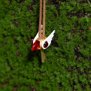 Exquisite magical girl jewelry with a detailed bird head key charm from Cardcaptor Sakura, made from PLA and alloy for a durable, long-lasting necklace perfect for anime lovers and cosplay accessories.