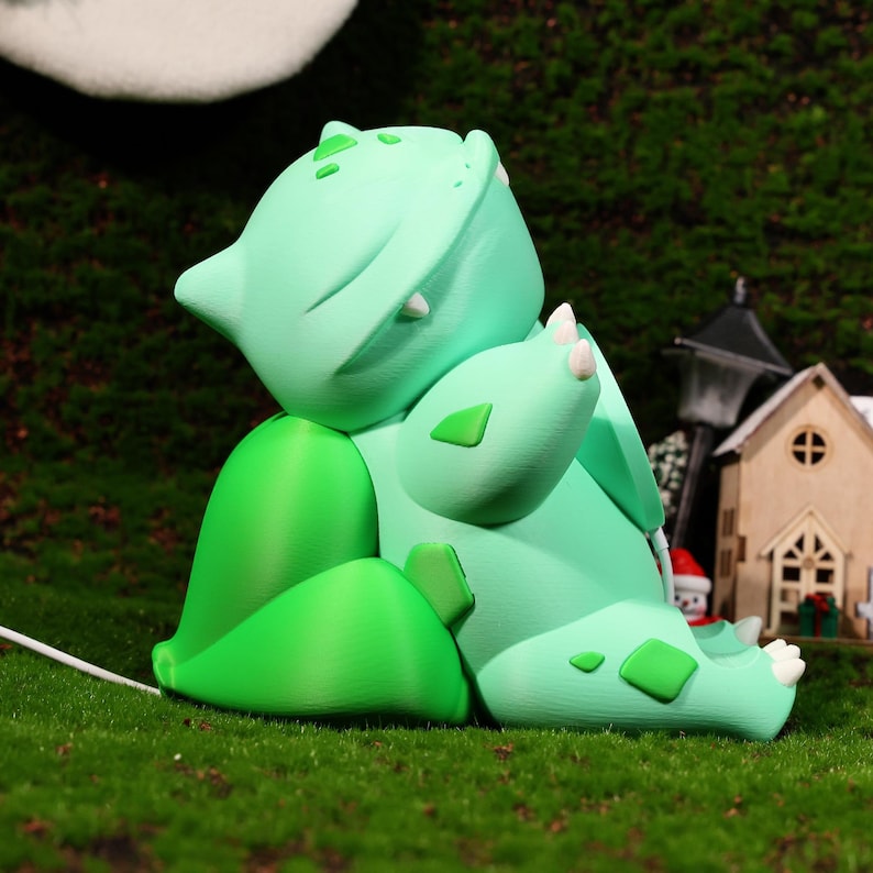 Cute and practical charging dock with a plant-inspired design. Ideal for fantasy and gaming fans, offering a dual-function phone stand and fast charging. Great gift for collectors and fans of quirky, functional home accessories.