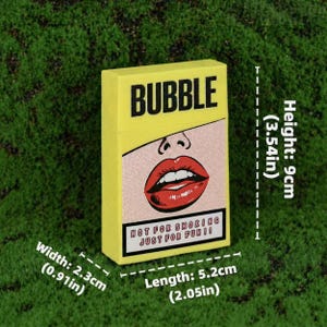 May include: A yellow rectangular box labeled BUBBLE with a pop art illustration of red lips. The text reads NOT FOR SMOKING JUST FOR FUN. Dimensions are 3.54 inches in height, 2.05 inches in length, and 0.91 inches in width as indicated by labels.