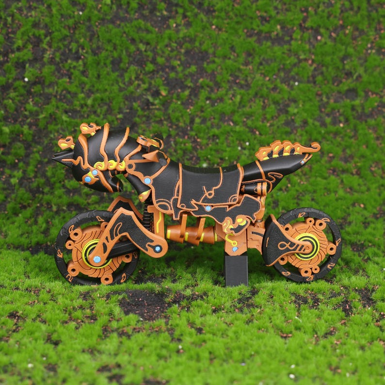 Close-up image of the suspension detail on the Master Cycle Zero 3D print from Zelda: Breath of the Wild and Tears of the Kingdom. This shot highlights the precision of the spring mechanism, showing how it adds realistic functionality to the display model. The detailing captures both the magical elements and advanced design of the bike, appealing to gamers, collectors, and fans of fantasy-themed engineering designs inspired by video game worlds.