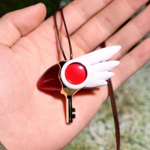 Portachiavi con testa di uccello di Cardcaptor Sakura, design iconico degli anime, perfetto per i fan, ciondolo portachiavi da collezione anime, regalo di compleanno per lei