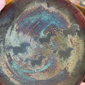 Vintage Ben Diller Raku iridescent pottery plate with galloping horses