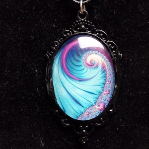 oval pendant, multi colored, black chain, black adornment