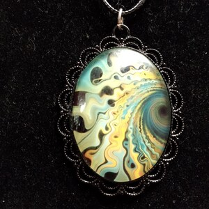 oval pendant, multi-colored , black chain, black adornment