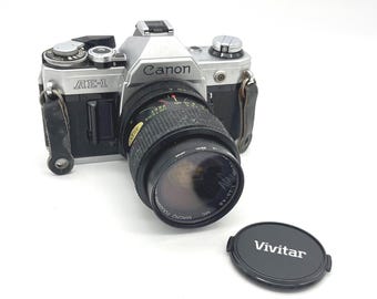 Canon AE-1 35mm SLR Film Camera Silver with Vivitar 28-70mm Macro Zoom Lens