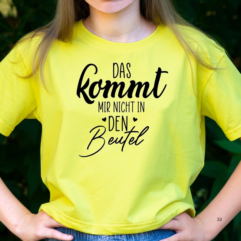 K&ouml;nnte beinhalten: Gelbes T-Shirt mit schwarzem Text, der "Das kommt mir nicht in den Beutel" lautet.