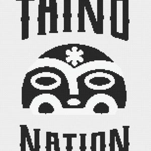 May include: A black and white graphic design featuring the words "TAINO NATION" in a pixelated font. The design includes a stylized mask with oval eyes and a floral element above it, all set against a white background.