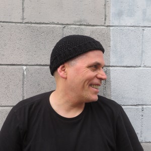 merino wool docker cap: hand crocheted black watch hat