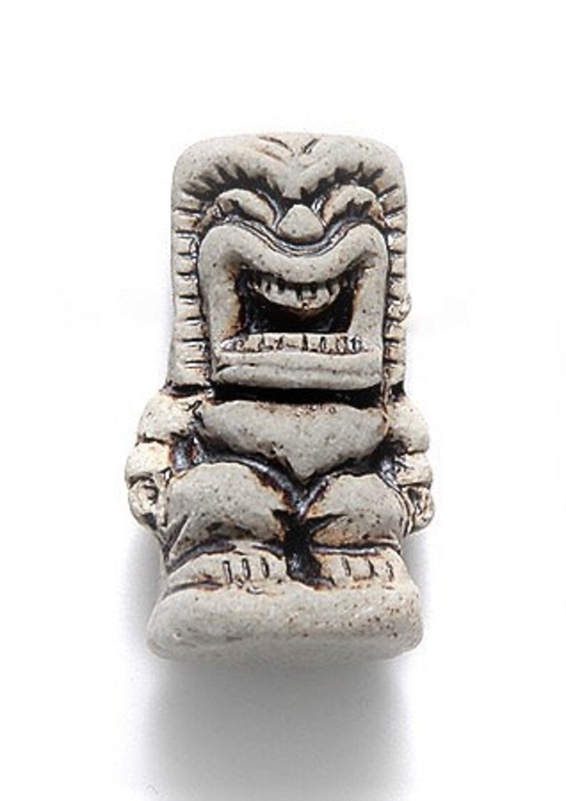 Tiny tiki statueEaster Island Head rockTiny head Etsy