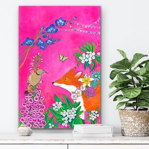 May include: A whimsical painting of a fox and a bird in a vibrant pink landscape. The fox is orange with white markings and is surrounded by colorful flowers. The bird is brown and white with a long tail. The background is a bright pink with a string of colorful flags.
