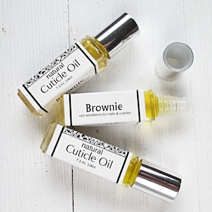 CLEARANCE PRICED, Moisturizing Oil, Cuticle or lip formula, Brownie flavor, Emollient rich formula, Vit E & Shea, lip safe, no spill bottle