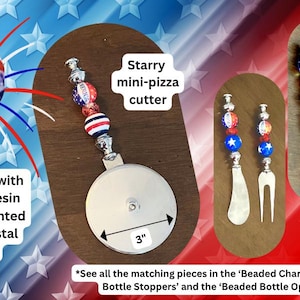 May include: A collection of patriotic kitchen accessories, including a pizza cutter (3 inches/7.6 cm), bottle opener, and bottle stopper. Each item features resin beads in red, white, and blue, accented with crystal spacers. The text reads "AMERICA".