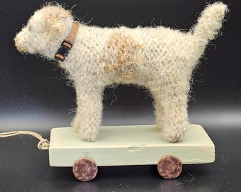 Handknitted Wool Terrier on Wooden Cart – Dog Sculpture