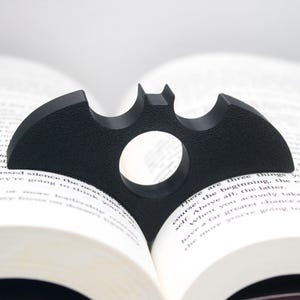 Supporto per pagine a forma di pipistrello / Divaricatore per pagine con pollice / Accessorio per la lettura con una mano