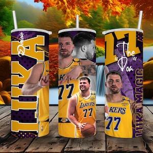 May include: Three 20 ounce stainless steel tumblers with a basketball theme. The tumblers feature a basketball player wearing a yellow and purple jersey with the number 77 on it. The text "The "Don" " and "LA Lakers Magic" are on the tumblers.