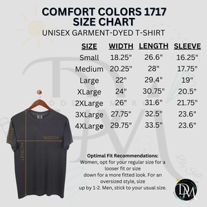 May include: Size chart for unisex garment-dyed t-shirts. The chart shows sizes from Small to 4XLarge with corresponding width, length, and sleeve measurements in inches.