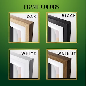 May include: A display showing four frame color options labeled FRAME COLORS. The options include an oak wood grain frame, a solid black frame, a solid white frame, and a dark walnut wood grain frame, each featuring a white mat and inner border.