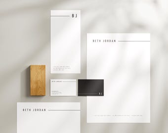 May include: A set of stationery featuring a minimalist design with the name "Beth Jordan" and the initials "BJ" in black text on a white background.