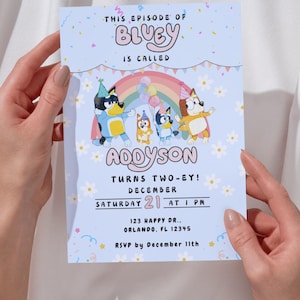 May include: Bluey birthday party invitation with a rainbow, cartoon dogs, and the text "This episode of Bluey is called Addyson Turns Two-ey! December 21 at 1 PM 123 Happy Dr. Orlando, FL 12345 RSVP by December 11th"