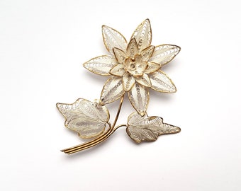 Vintage sterling silver filigree flower brooch with gold accents full hallmark