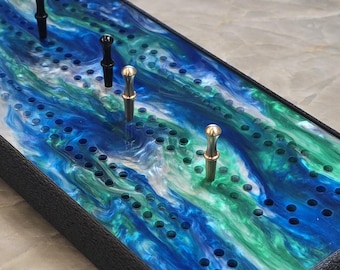 Blue, green and pearl acrylic cribbage board