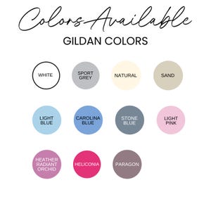 May include: A colour chart showing various GILDAN colours, with the text "Colors Available." The chart presents circular colour swatches, including white, sport grey, natural, sand, light blue, carolina blue, stone blue, light pink, heather radiant orchid, heliconia, and paragon.