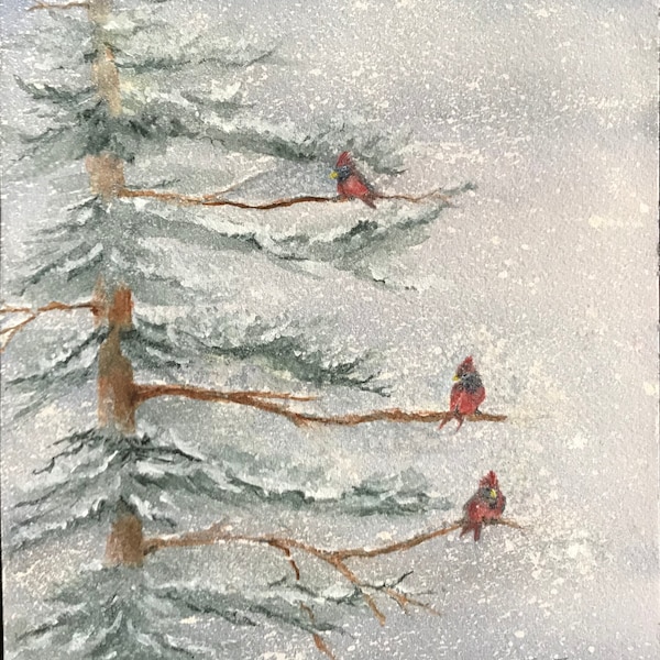 Fine Art Watercolor Image with Cardinals on Pine Tree Branches On A Snowy Blizzard,Frigid, Cold Winter Day by Janet Dosenberry