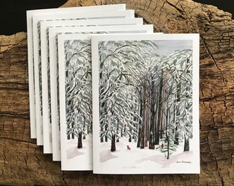 May include: A stack of blank greeting cards featuring a snowy forest scene with red cardinals. The image is a watercolour painting with a white background.