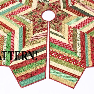 May include: A quilted Christmas tree skirt with a starburst design. The skirt features a variety of festive fabrics in red, green, and cream, with a repeating pattern of stripes and holiday motifs. The word "PATTERN!" is printed on the skirt.