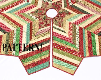 May include: A quilted Christmas tree skirt with a starburst design. The skirt features a variety of festive fabrics in red, green, and cream, with a repeating pattern of stripes and holiday motifs. The word "PATTERN!" is printed on the skirt.
