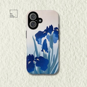 May include: A rectangular smartphone case featuring a printed illustration of deep blue iris flowers with green stems and leaves against a pale, gradient background. The case has a black camera cutout area and the text The Case Exhibit in the corner.