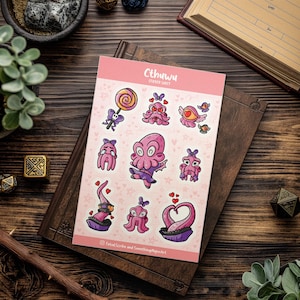 May include: A sticker sheet featuring cute, pink Cthulhu-themed illustrations. The sheet includes a variety of Cthulhu characters with hearts, stars, and other cute details. The text "Cthulhu Sticker Sheet" is at the top of the sheet.