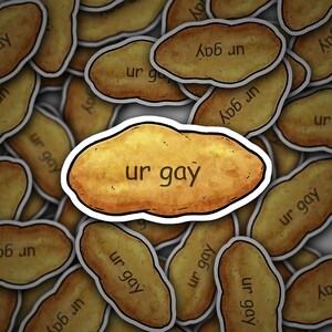 May include: A collection of stickers with a potato shape and the text "ur gay" in a handwritten style. The stickers are various shades of brown and tan, with a white border.