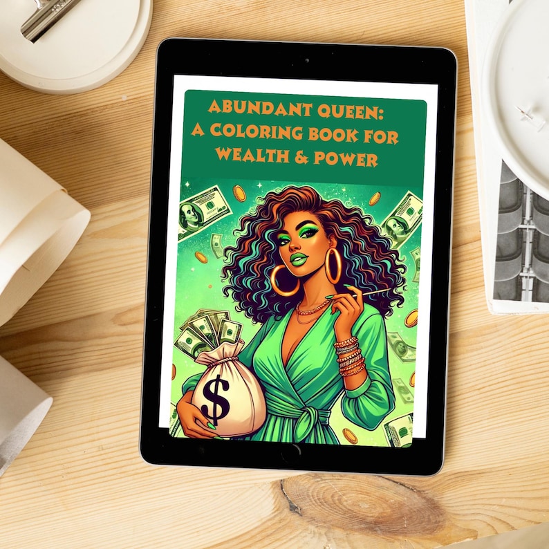 Op de afbeelding: Een kleurboekomslag met een vrouw met krullend haar en groene kleding die een geldzak vasthoudt. De titel van het boek is "Abundant Queen: A Coloring Book for Wealth & Power".