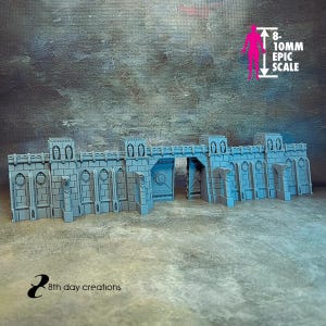 May include: A gray miniature fortress wall section featuring stone brick textures, arched window details, and a central gate. The structure includes a graphic indicating an 8-10mm epic scale. The text 8th day creations is visible in the bottom corner.