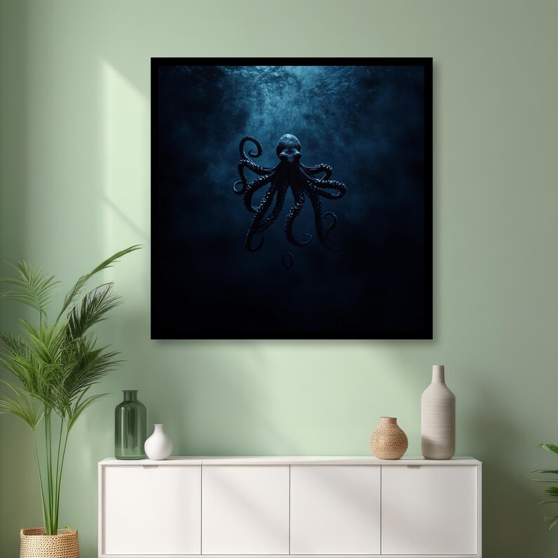 May include: A framed art print featuring a dark blue octopus in a deep sea setting. The octopus has multiple tentacles and is centered in the frame against a dark, moody background. The artwork evokes a sense of mystery.