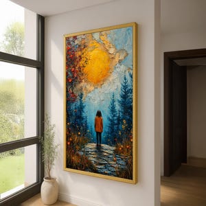 May include: A framed landscape painting shows a person standing on a stone path, facing a bright yellow sun. The artwork features blue trees, colourful flowers, and a textured sky. The frame is gold.