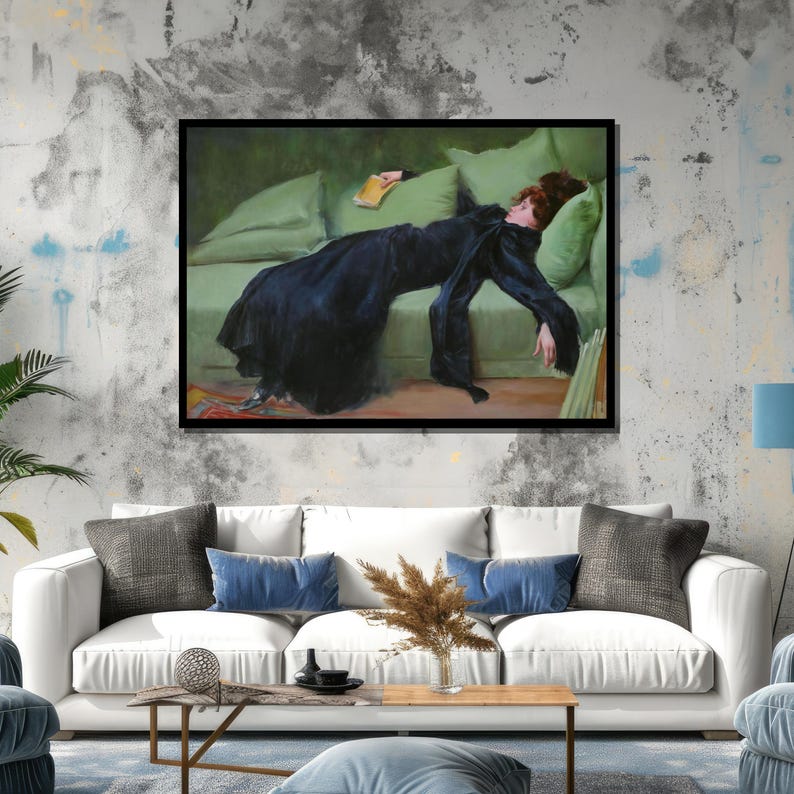 May include: A painting of a woman in a black dress lying on a green couch. She is holding a book in her hand and her head is resting on a pillow.