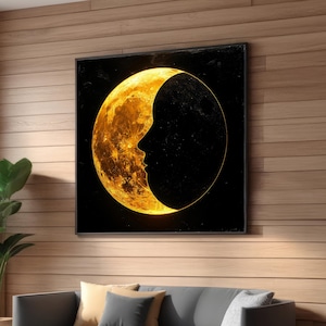 May include: A black and gold crescent moon with a silhouette of a face inside. The moon is set against a black background.