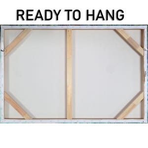 K&ouml;nnte beinhalten: R&uuml;ckseite eines aufgespannten Leinwandkunstwerks mit Holzst&uuml;tzen und wei&szlig;er Leinwand. Der Text "READY TO HANG" ist oben in Schwarz aufgedruckt. Die Leinwand ist fertig zum Aufh&auml;ngen.