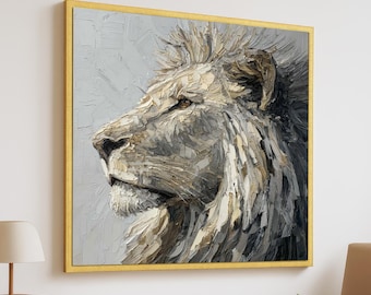 May include: Square framed canvas art featuring a profile of a lion's head. The artwork uses a palette of gray, white, and tan tones, with a textured, impasto style. The frame is a warm gold color, adding a touch of elegance.