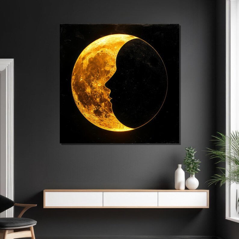 May include: A crescent moon with a golden glow, the shape of a face is visible in the dark silhouette.