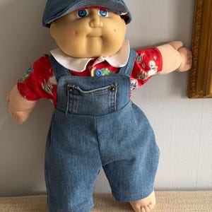 May include: A set of three ceramic nesting bowls in shades of blue, green, and white. The bowls feature a speckled glaze and a simple, modern design. The largest bowl measures approximately 6 inches in diameter.