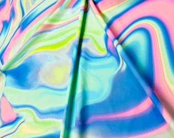 May include: Abstract swirl fabric with a blue, green, pink, and yellow colour scheme. The fabric has a smooth, silky texture.