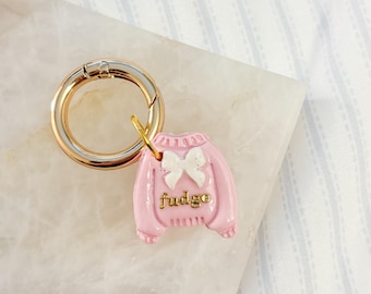 Coquette bow sweater pet ID tag