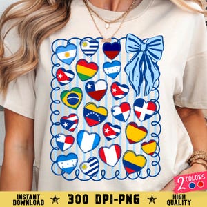 May include: A cream-colored t-shirt featuring a design of heart-shaped flags from various countries, framed by a blue border with a bow. The text "INSTANT DOWNLOAD" and "300 DPI-PNG" are at the bottom. The design includes flags from Argentina, Brazil, Cuba, and more.