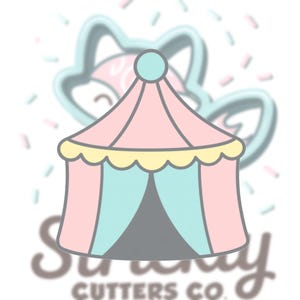 May include: A pastel-colored circus tent cookie cutter. The tent is pink with a yellow scalloped trim and blue curtains. A light blue fox outline is in the background, along with the text "Sunny Cutters Co."