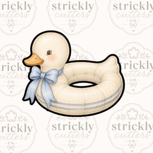 May include: A whimsical duck-shaped cookie cutter. The duck has a cream-colored body, a light orange beak, and a light blue bow. The duck is wearing a light blue and cream-colored inner tube. The text "strickly cutters" is visible.